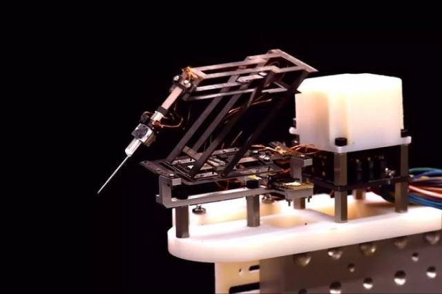 哈佛研究人员开发基于折纸造型高精度微型手术机器人插图(1)